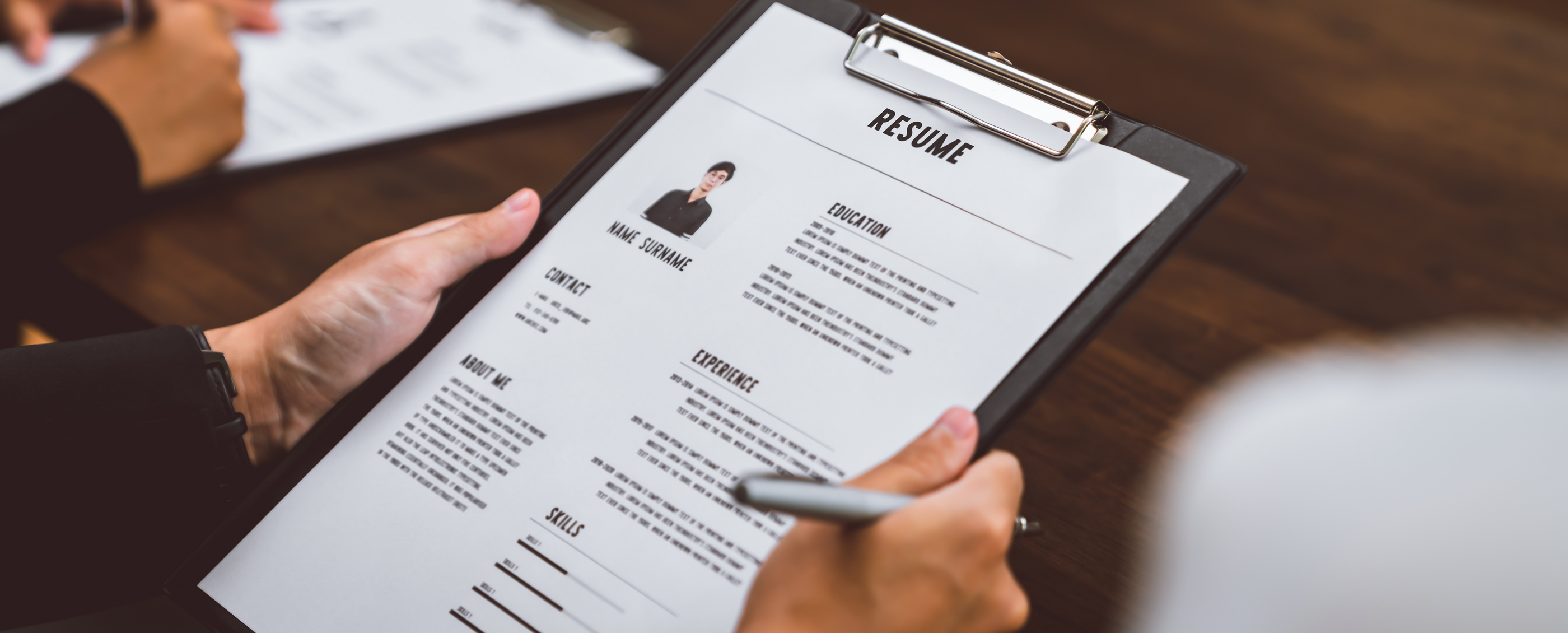 Businesswoman submits resume employer